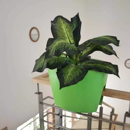 Limonkowa donica Balpot na balustradzie schodów